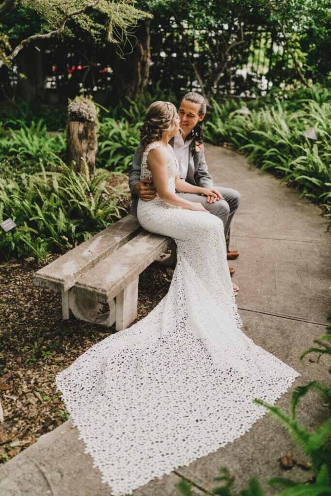 couple sitting in a garden sofa