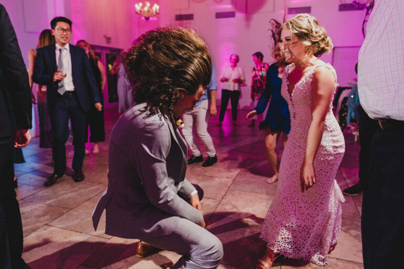 groom dressed as superhero in a wedding