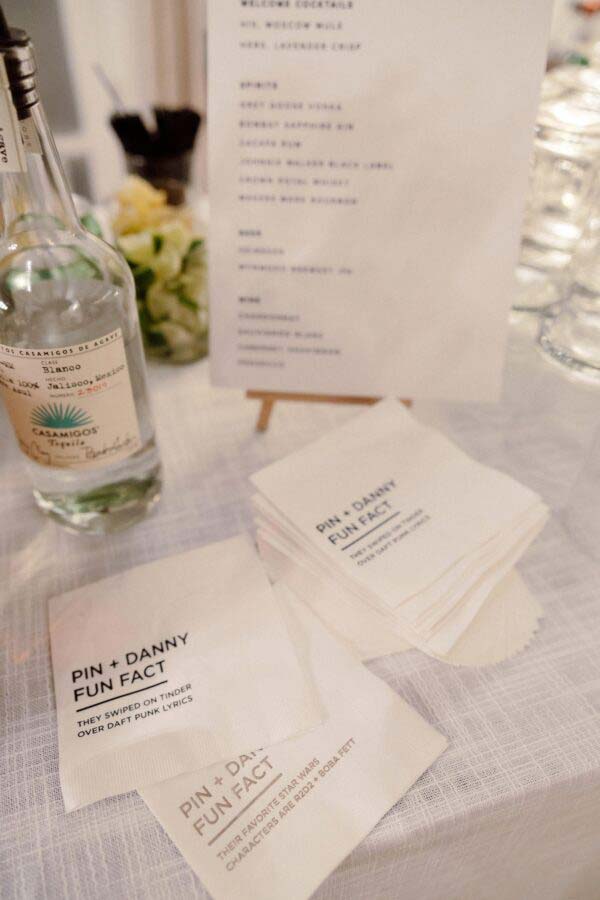 papers and wine bottle on a table