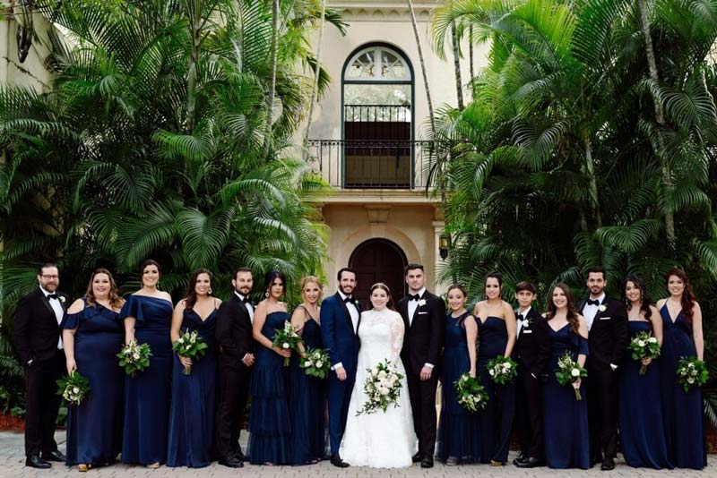 people giving photos in a wedding