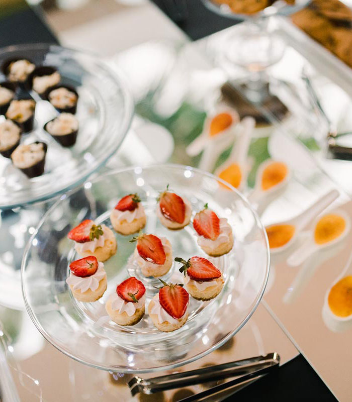 dessert selections on clear serving trays